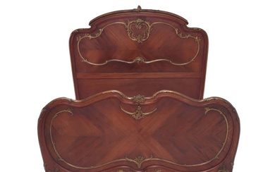 FRENCH MAHOGANY AND GILT BRONZE MOUNTED FULL SIZE BED IN...