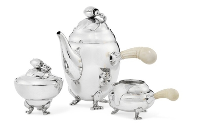 Georg Jensen: “Blossom”. Sterling silver coffee set. Comprising a coffeepot, a creamer and a sugar bowl with cover. (3)
