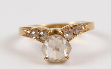 Gold ring (750) half cushion cut diamond (about 0.90 ct)...