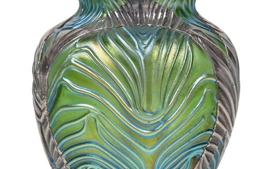 Loetz (Austrian), an iridescent glass Formosa vase with silver appliqué, c.1900, ground out pontil, The green glass of shouldered oviform decorated with wavy and pulled bands in shallow relief and heightened with blue iridescence, further...