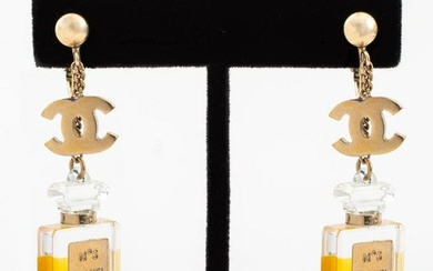 Pair of Chanel Runway earring clips with Chanel Number 5 perfume bottle and gold-tone metal