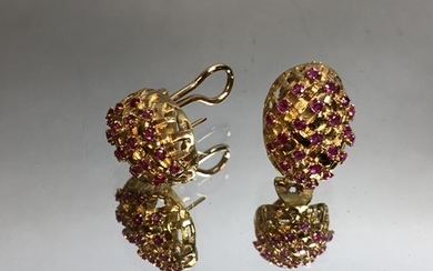 Pair of gold and ruby earrings in the...
