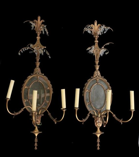 Pair of mirror back wall sconces, the feather top above