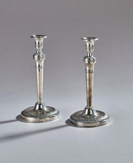 Pair of silver candleholders decorated with roses and palmettes. Marked Vieillard (1819-1938).