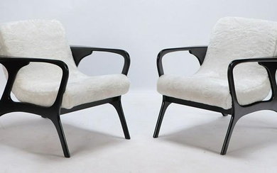 Pair wood and upholstered lounge chairs in the manner of Vladimir Kagan. Ht: 31" Wd: 30" Dpth