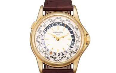 Patek Philippe Reference 5110J-001 | A yellow gold automatic world time wristwatch, Circa 2001