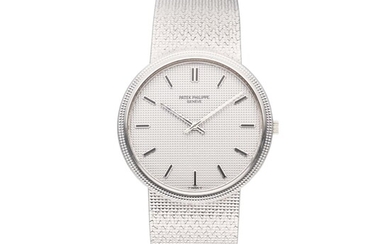 Patek Philippe Reference 3611/1 Calatrava | A white gold bracelet watch with hobnail bezel and dial, Circa 1975