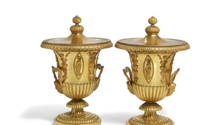 Pierre Philippe Thomire: A pair of Empire gilt bronze campana vases with covers. Stamped 'THOMIRE'. Early 19th century. (2)