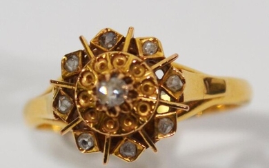 RING in 750/1000th yellow gold set with 9 rose-cut diamonds...