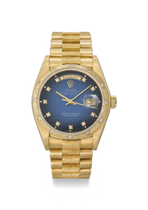 ROLEX. A RARE AND ATTRACTIVE 18K GOLD AND DIAMOND-SET AUTOMATIC WRISTWATCH WITH SWEEP CENTRE SECONDS, DAY, DATE, BLUE DEGRADE DIAL AND BRACELET, SIGNED ROLEX, OYSTER PERPETUAL, DAY-DATE, REF. 18048, CASE NO.6’387’244, CIRCA 1980
