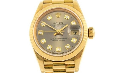ROLEX - an Oyster Perpetual Datejust bracelet watch. Circa 1995. 18ct yellow gold case with fluted