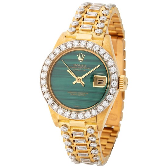 Rolex. Charismatic and Colorful “Octopus” Datejust Automatic Wristwatch in Yellow Gold, reference 6913/8, With Malachite Dial, Diamond-set Bezel, Original Paper and Additional Dial