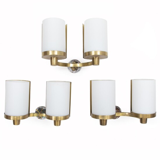 NOT SOLD. Rolf Graae: Set of three wall lamps of brass, each with two sockets. Cylinder shaped shades of opal glass. (3) – Bruun Rasmussen Auctioneers of Fine Art