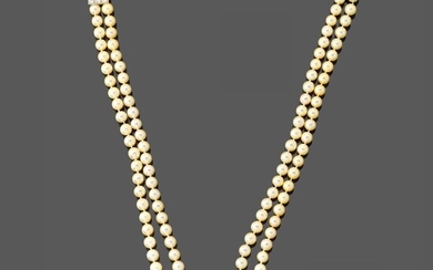 Sautoir double rangs de perles de culture. Rehaussé de deux intercalaires en or gris sertis...