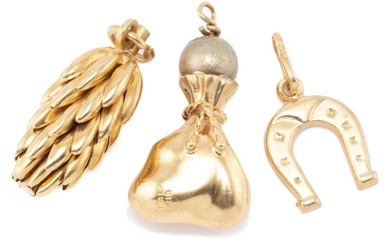 THREE 18CT GOLD CHARMS; a coin bag with gilt faux pearl, a horseshoe and a pine cone, total wt. 8.12g.