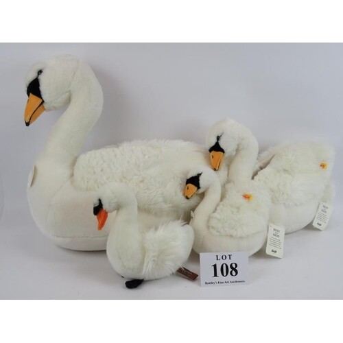 Three Steiff Schana swan plush toys of varying sizes, plus a...