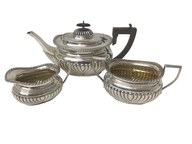 Three piece early George V silver tea set