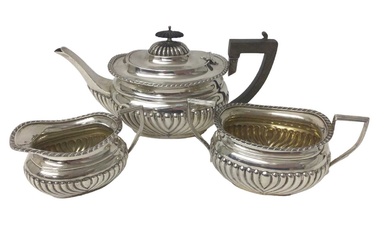 Three piece early George V silver tea set