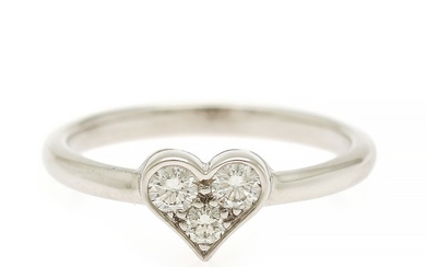 Tiffany & Co.: A heart ring set with three brilliant-cut diamonds, mounted in platinum. Size 50.