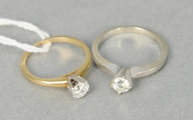 Two 14 karat yellow gold and diamond engagement rings