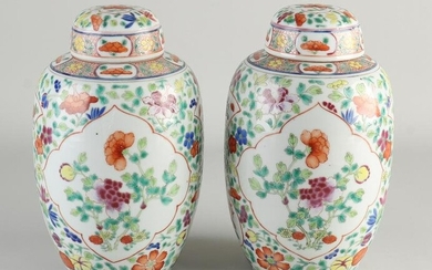 Two Chinese lidded pots, H 20.5 cm.