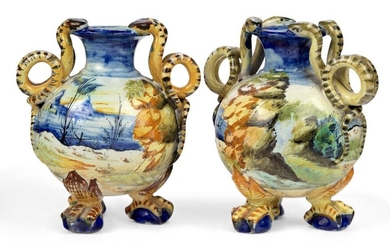 Two Florence maiolica small two-handled vases, late 19th century, manganese cockerel marks for the Cantagali workshop, manganese A mark to one and 31 (?) to the other, each of globular form on three paw feet, with waisted necks and scrolling snake...