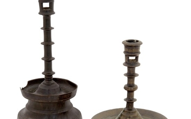 Two Very Rare Northwestern European Cast Brass Circular-Based Candlesticks, 15th and Early 16th Century