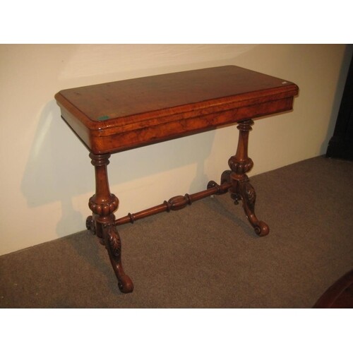 Victorian Walnut Games Table with fold over top on twin carv...