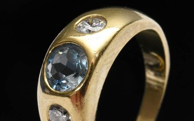 Yellow gold 750 band ring with faceted aquamarine (ca. 0.60ct) and 2 brilliants (together ca. 0.25ct/SI-P1/W-TCR), 6,9g, size 53