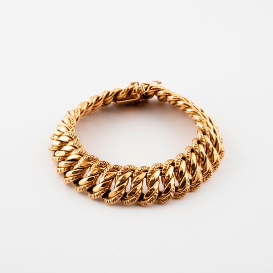 Yellow gold bracelet (750) with partially filed American...