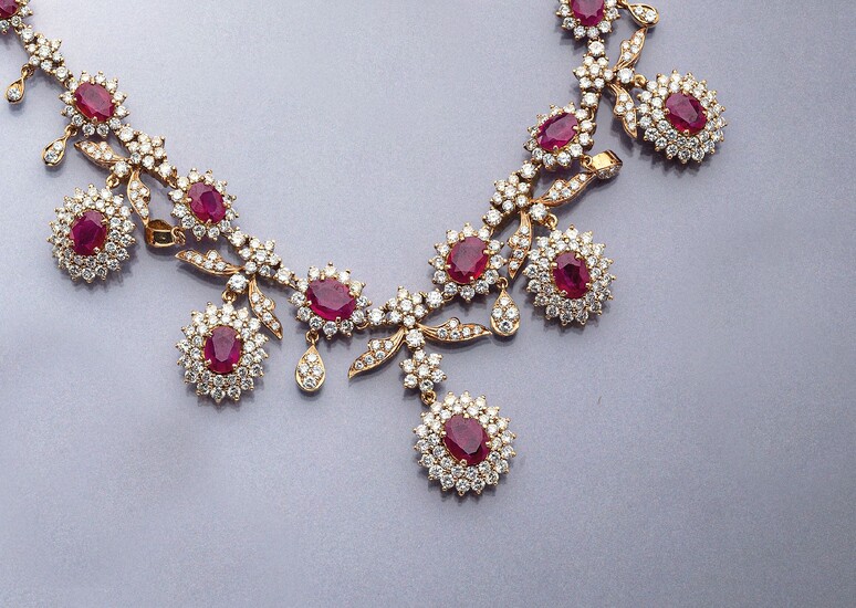 18 kt gold necklace with rubies and brilliants...