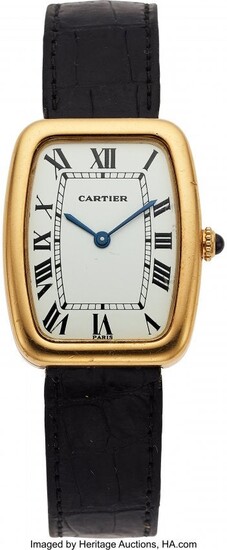 54080: Cartier, "Faberge" 18k Gold Tonneau Wristwatch