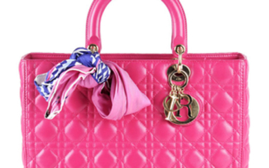 CHRISTIAN DIOR - a fuchsia pink leather Cannage Lady Dior GM handbag.