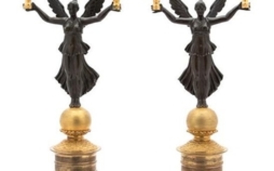 A Pair of French Empire Patinated and Gilt Bronze Two-Light Candelabra
