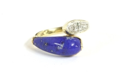 A gold diamond and Lapis Lazuli crossover ring