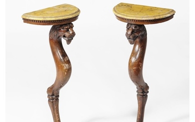 A pair of Regency pine and simulated marble console tables