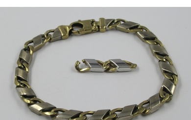 9ct Gold two colour gold bracelet, together with spare link,...