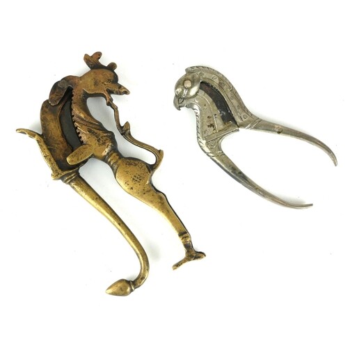 A 19TH CENTURY INDIAN WHITE METAL NUT CRACKER IN THE FORM OF...