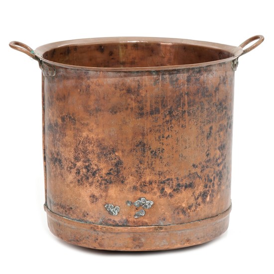 A 19th century copper cauldron. H. 52. Diam. excluding handles 55 cm.