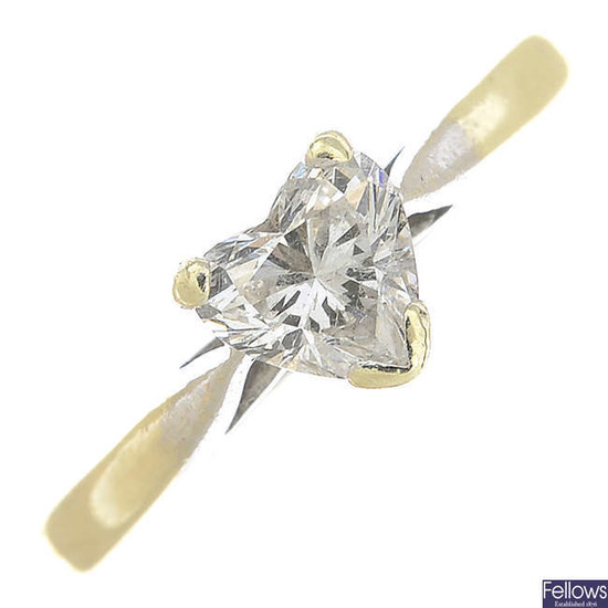 A 9ct gold heart-shape diamond single-stone ring.