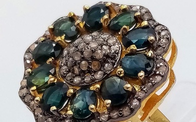 A Blue Sapphires & Diamond Decorative Floral Ring set...