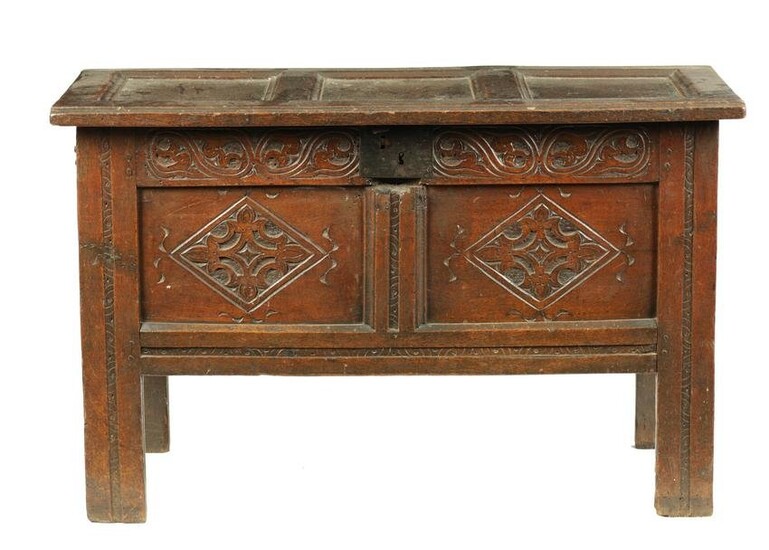A CHARLES II JOINED OAK COFFER OF SMALL SIZE the hinged