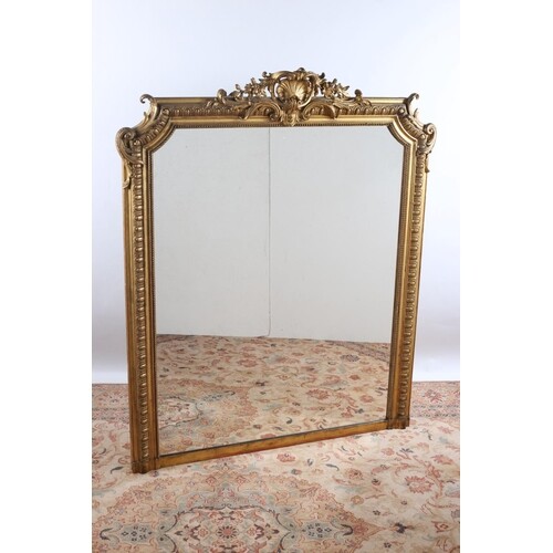 A CONTINENTAL GILTWOOD AND GESSO OVERMANTLE MIRROR the recta...