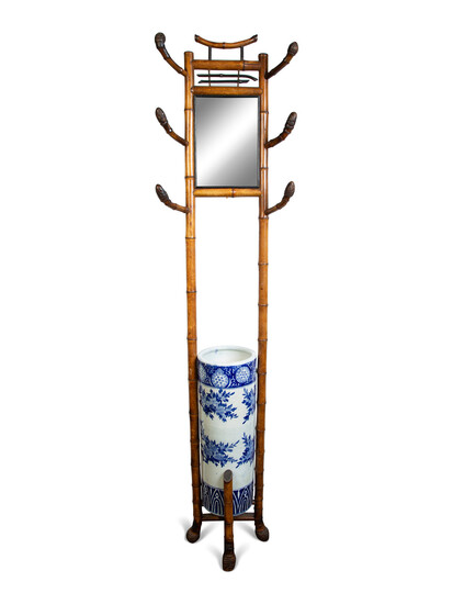 A Chinese Bamboo Hall Stand Fitted with a Blue and White Porcelain Umbrella Jar