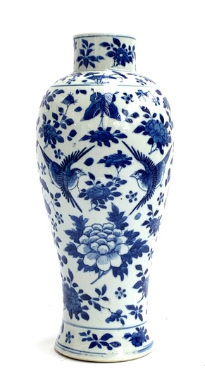 A Chinese blue and white porcelain vase of baluster form, de...