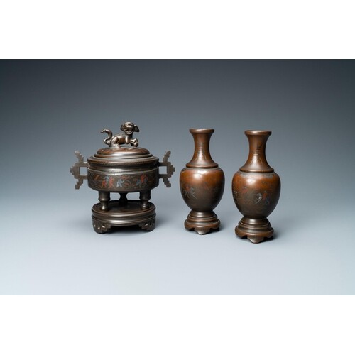 A Chinese inlaid bronze censer and a pair of vases for the V...