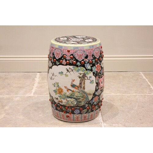 A Chinese porcelain famille noir opium stool, early 20th cen...