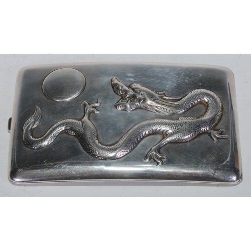 A Chinese silver rounded rectangular cigarette case, chased ...