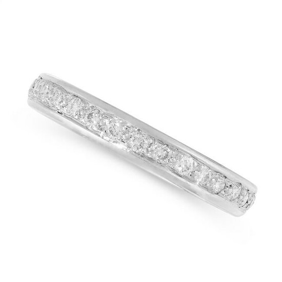 A DIAMOND ETERNITY RING in 18ct white gold, the band