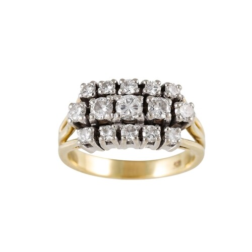 A DIAMOND THREE ROWED RING, mounted in 14ct gold. Estimated...